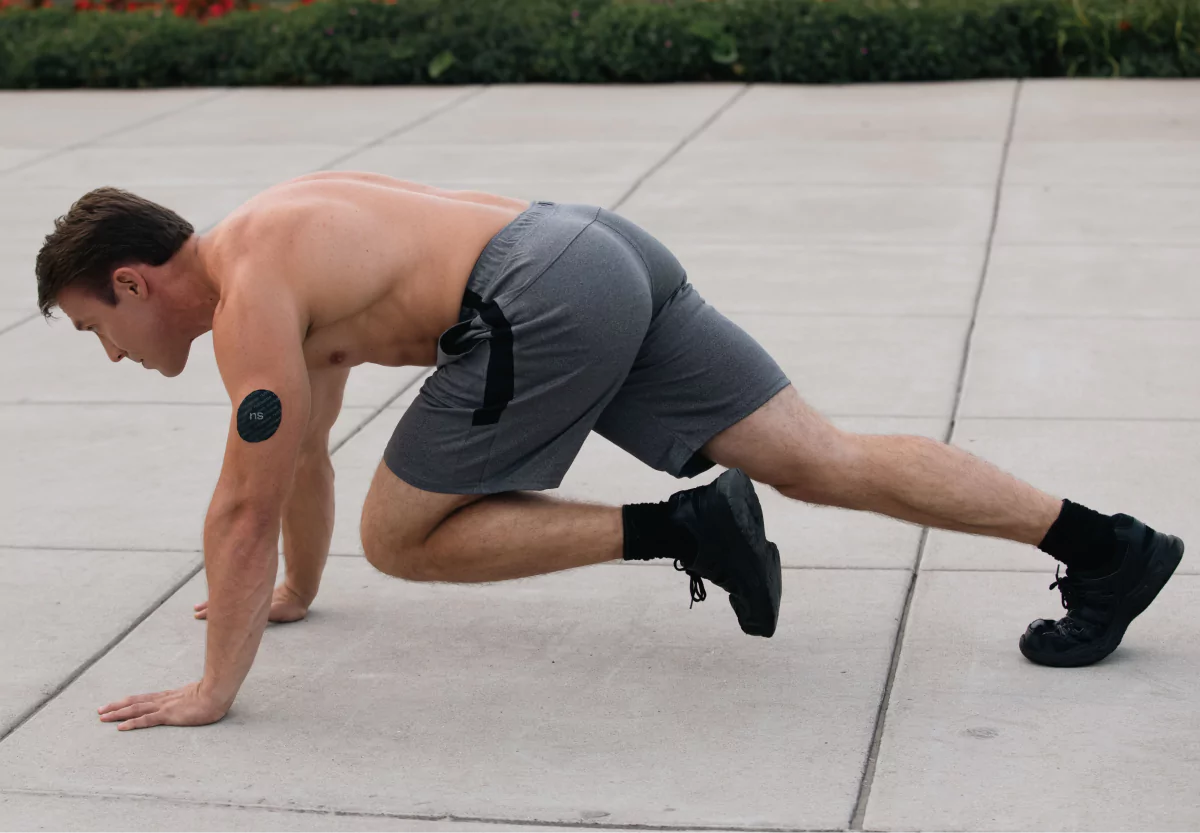 a man doing spiderman planks