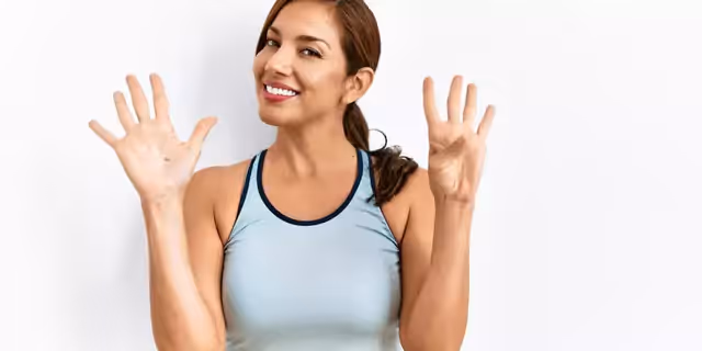 a person showing nine fingerers 