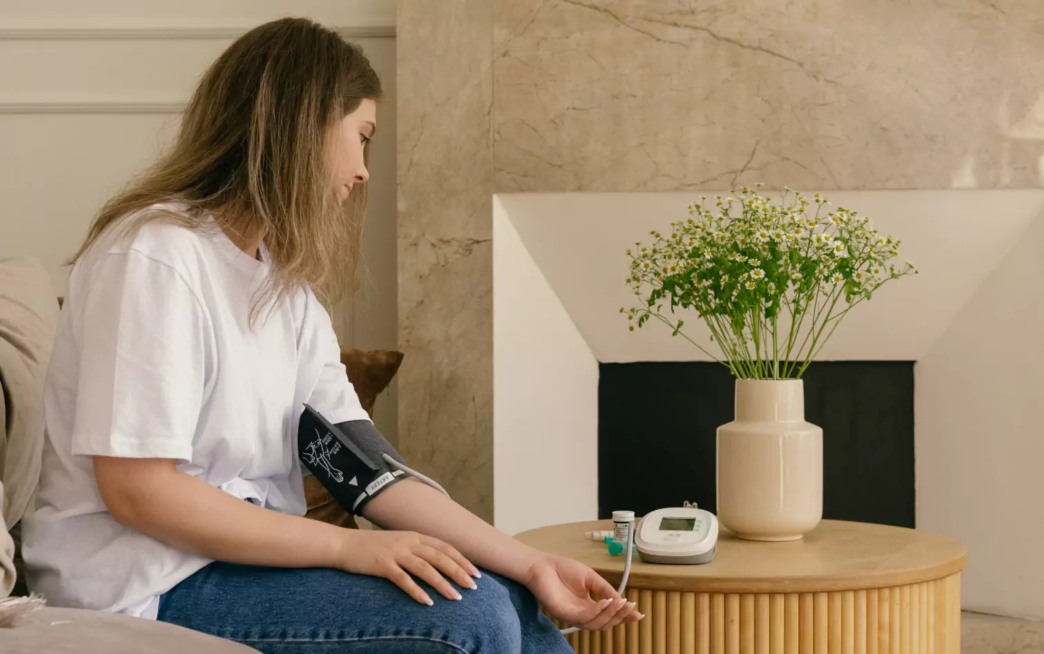 a person measuring blood pressure 