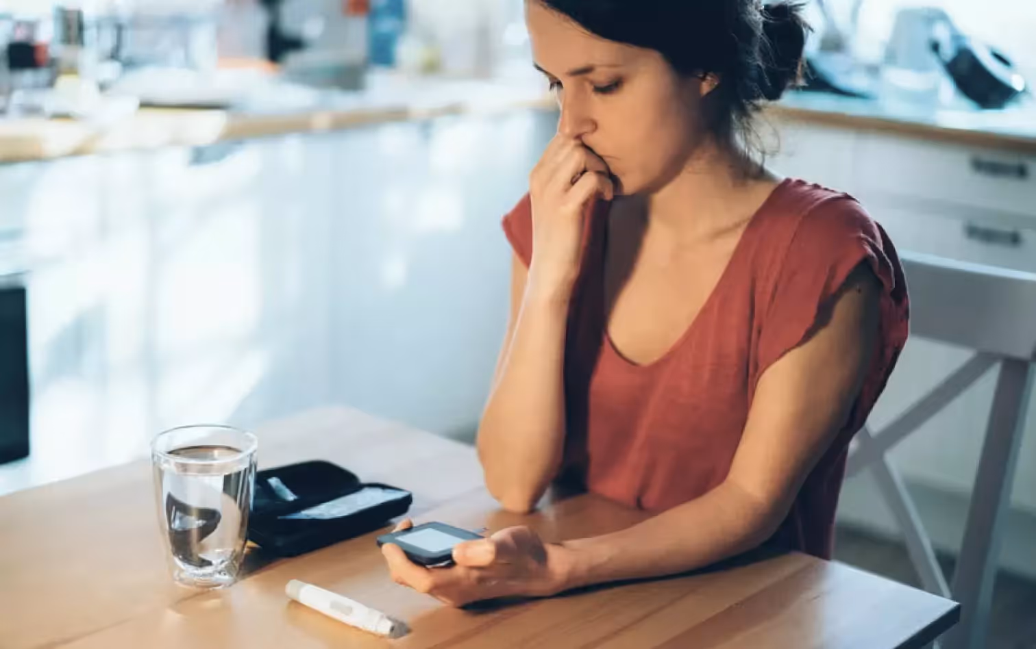 a person checking their glucose level