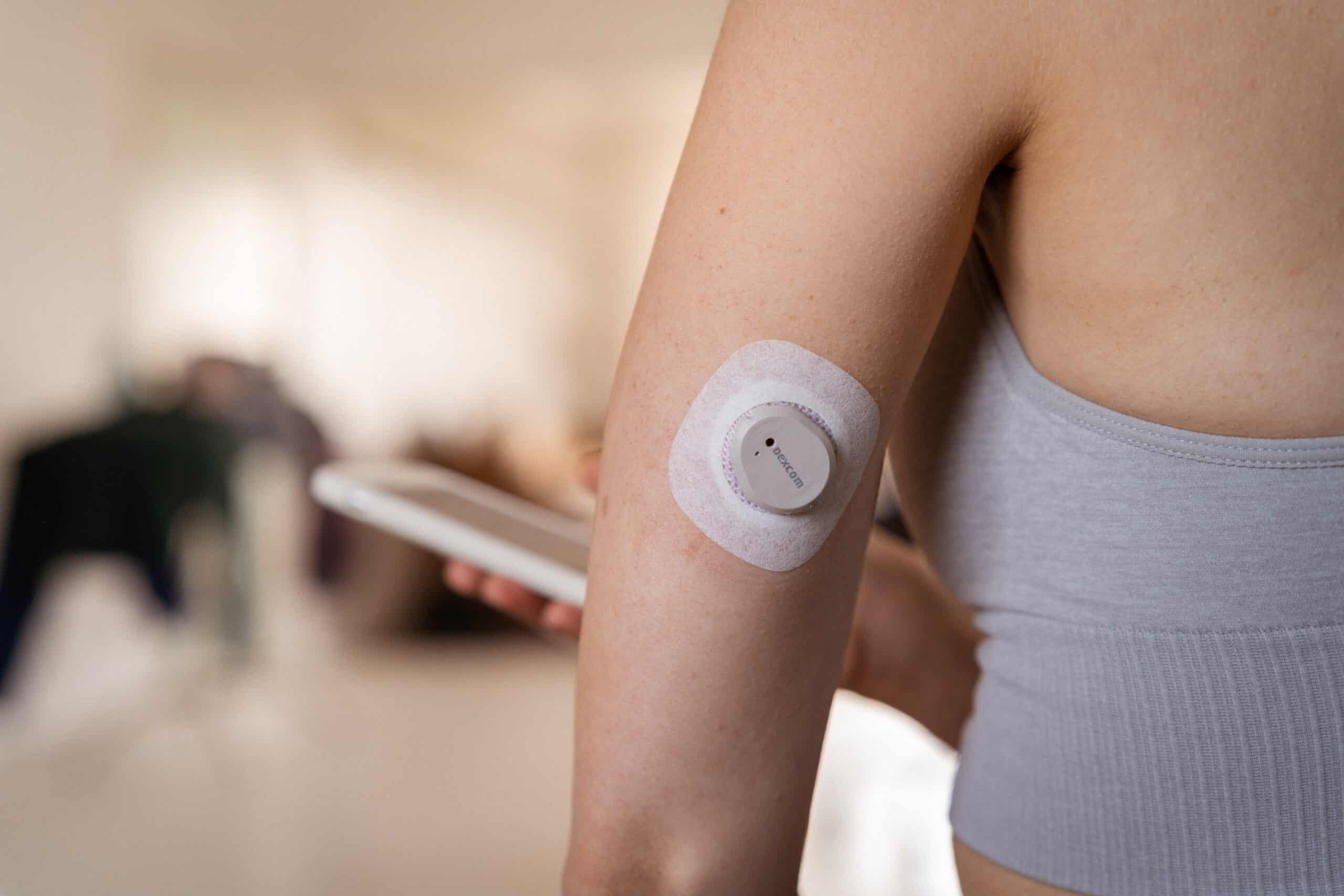 someone opening a cgm to apply it