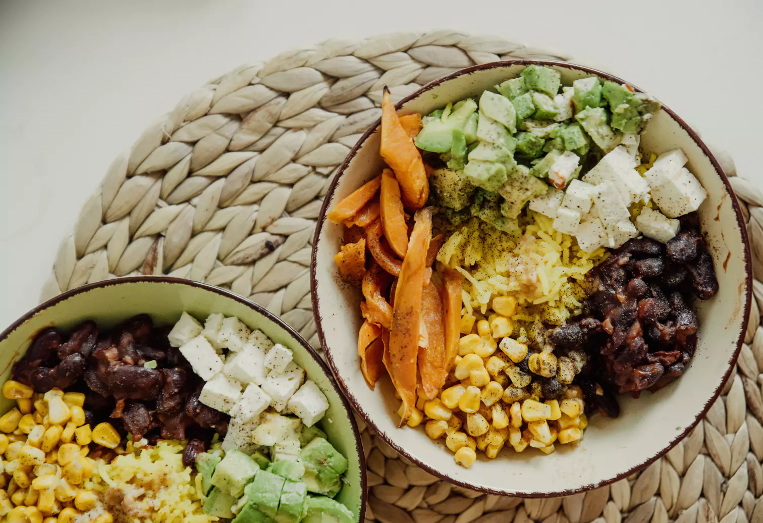 a plate of rice, veggies, avocado