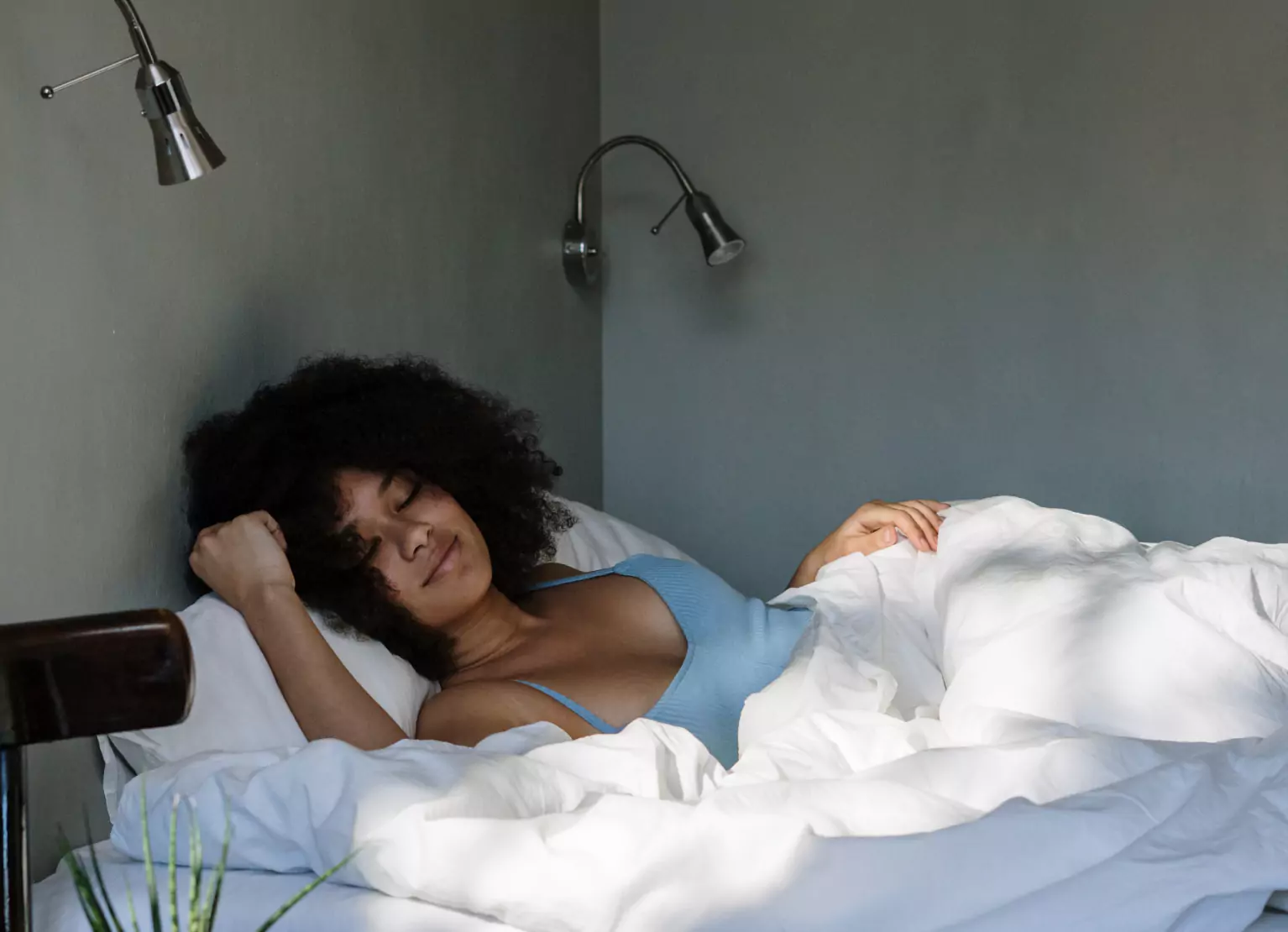 a person sleeping peacefully on bed