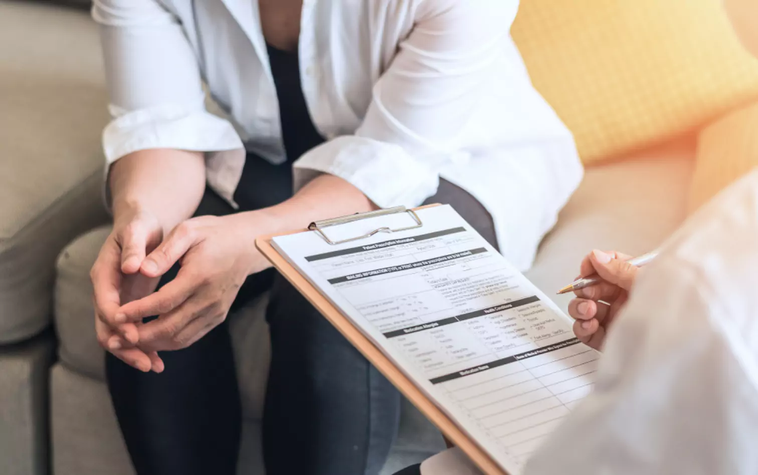 a doctor making notes 