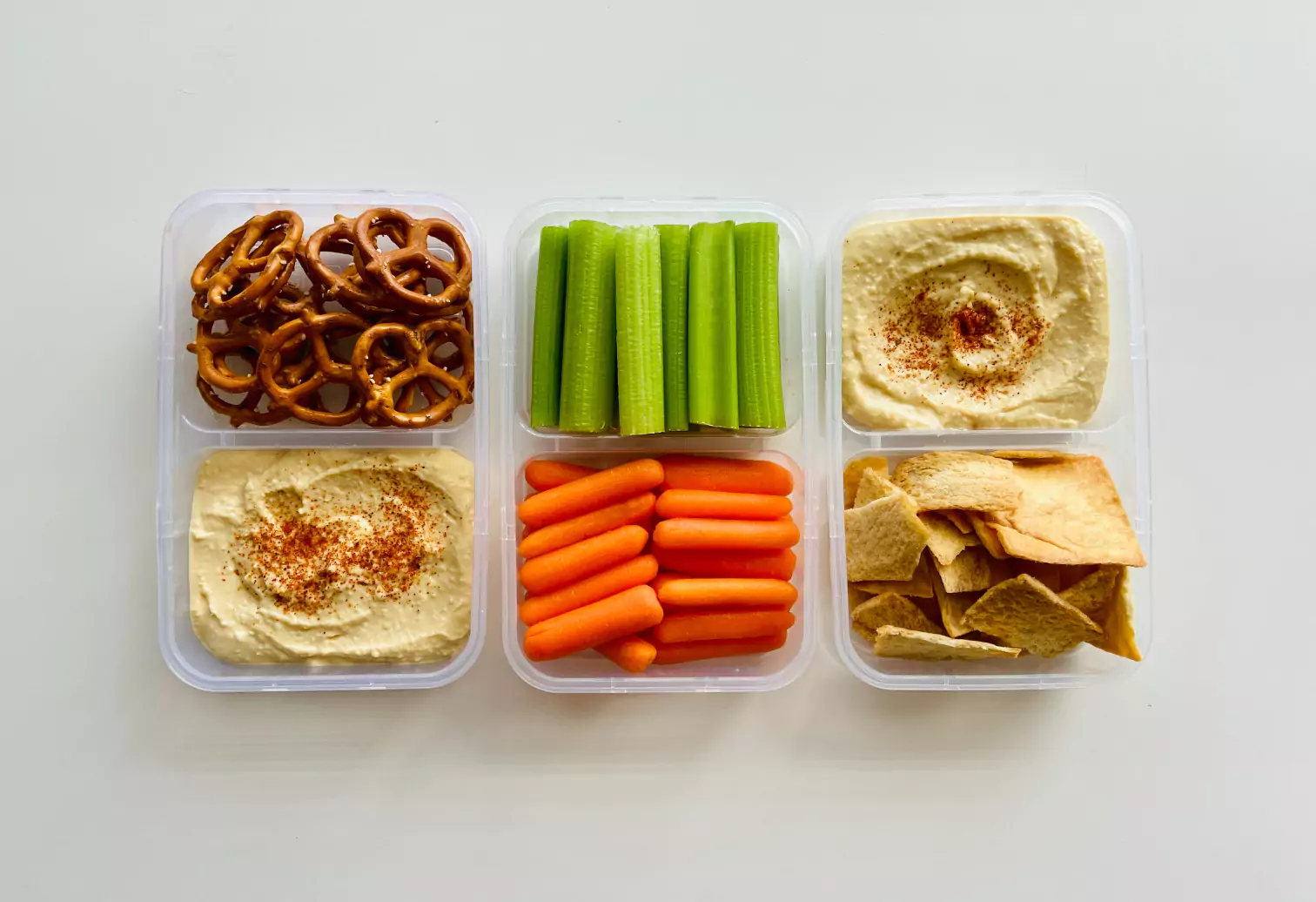 celery, carrots, hummus, and other snacks