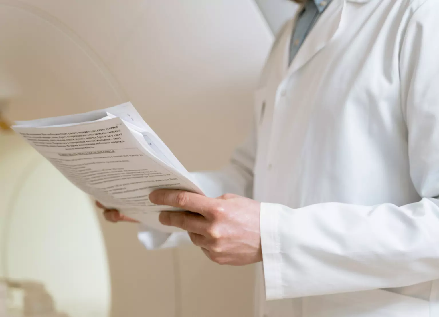 a doctor reading a report