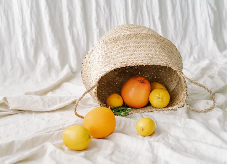 a basket ull of oranges