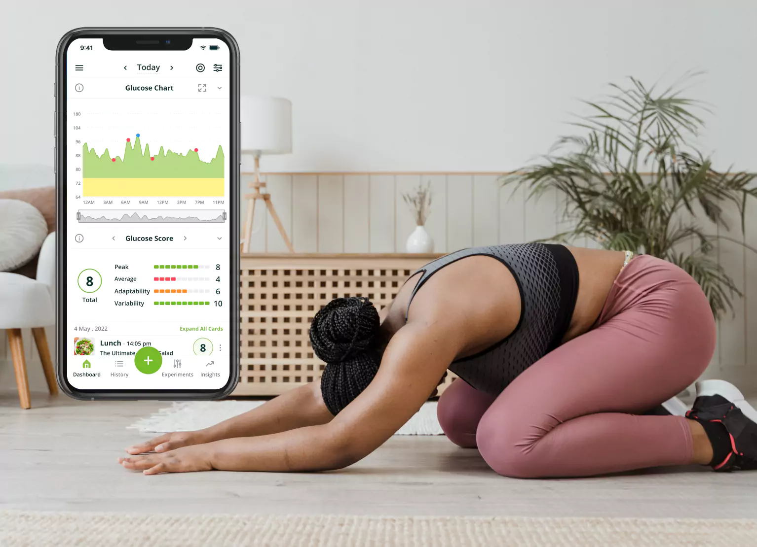 A person stretching and a diagram of a glucose chart with the Nutrisense app in a mobile phone on the left