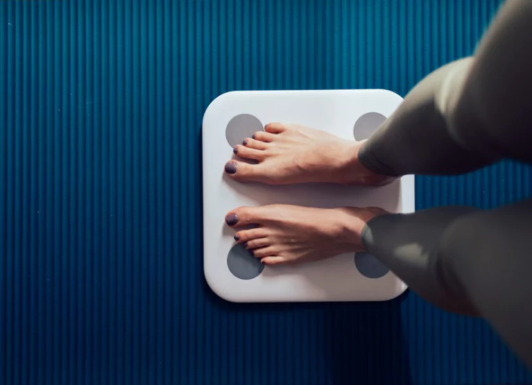 someone standing on a scale