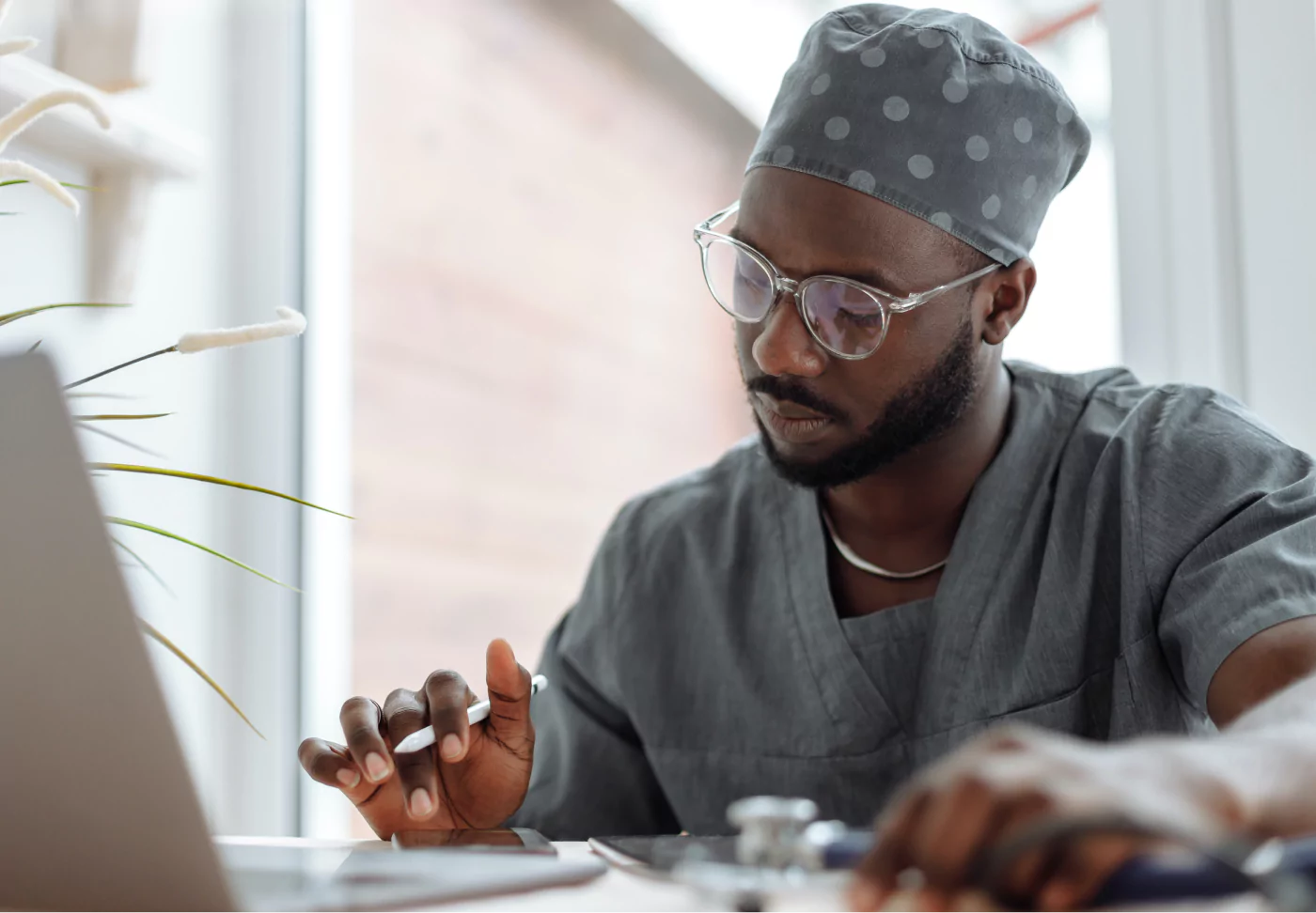 a doctor taking notes about a patient