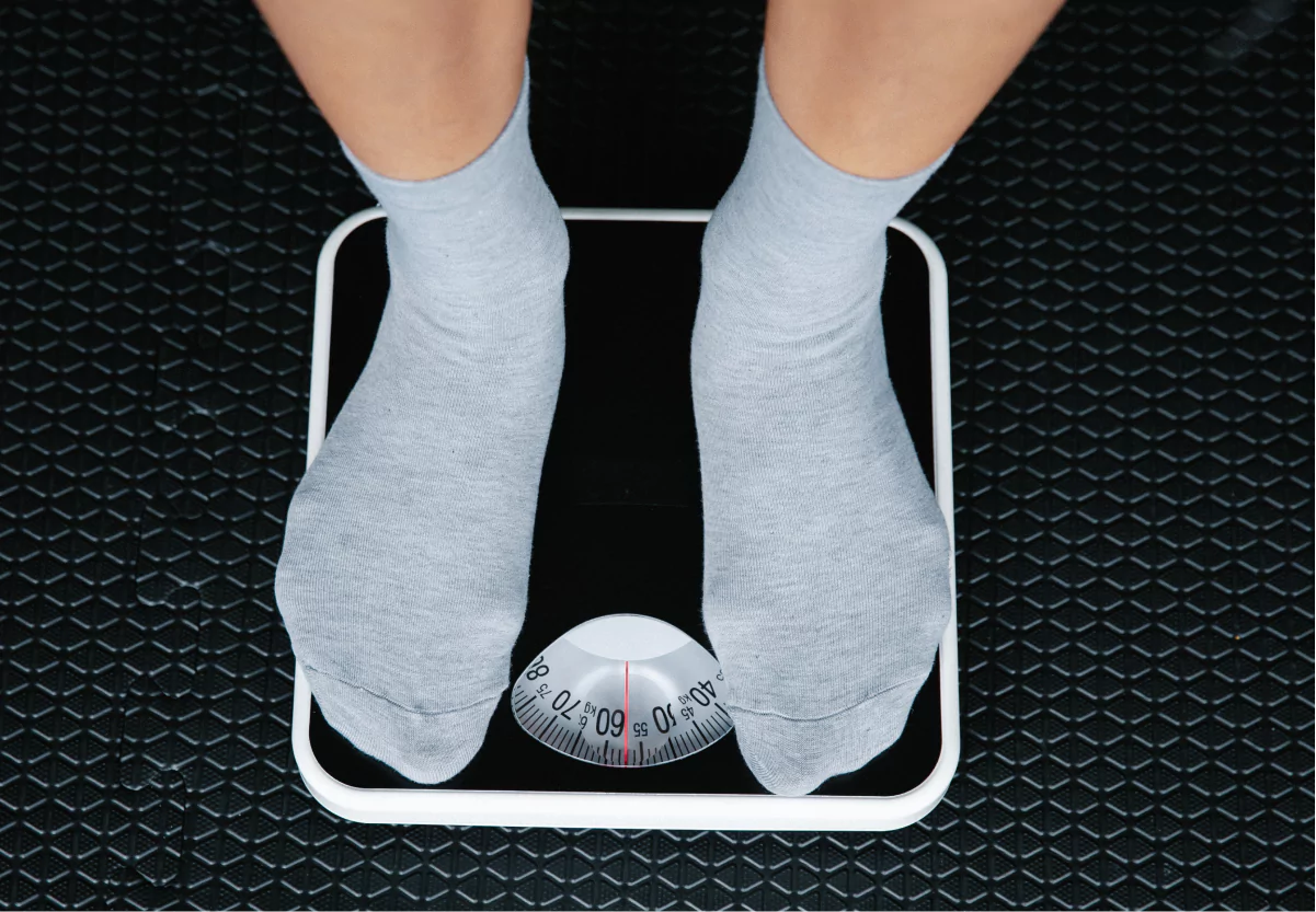 someone standing on a scale